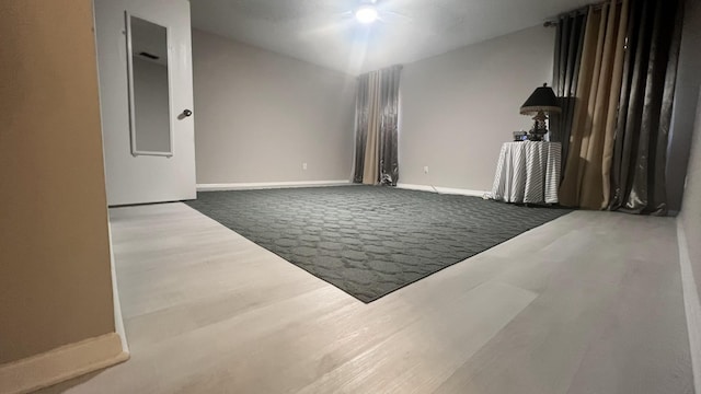 spare room featuring carpet flooring