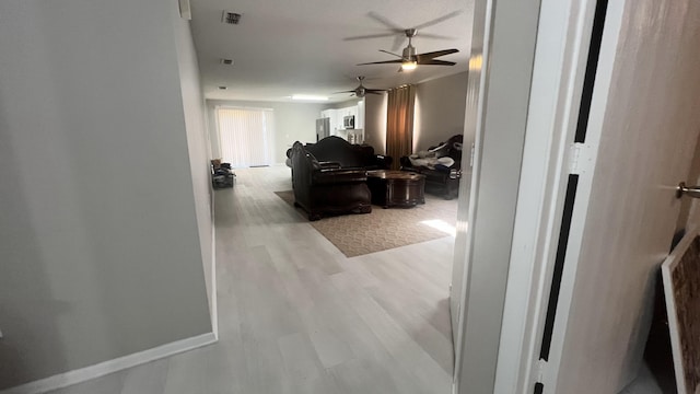 hall featuring light hardwood / wood-style floors