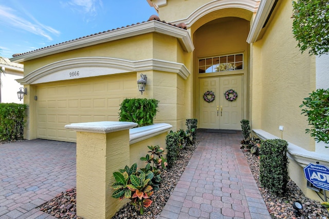 entrance to property with a garage