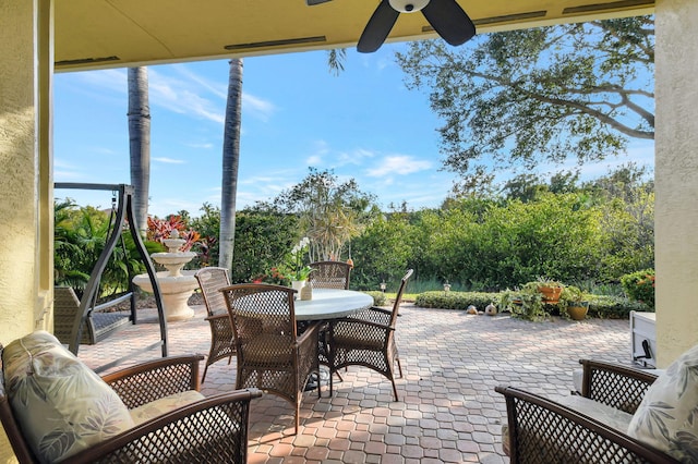 view of patio / terrace featuring ceiling fan