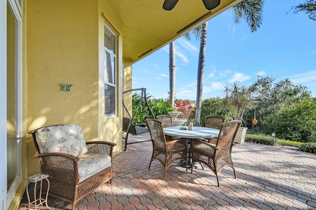 view of patio / terrace featuring ceiling fan