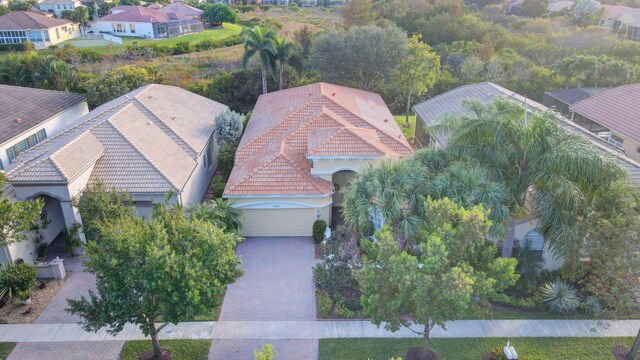 mediterranean / spanish house with a garage