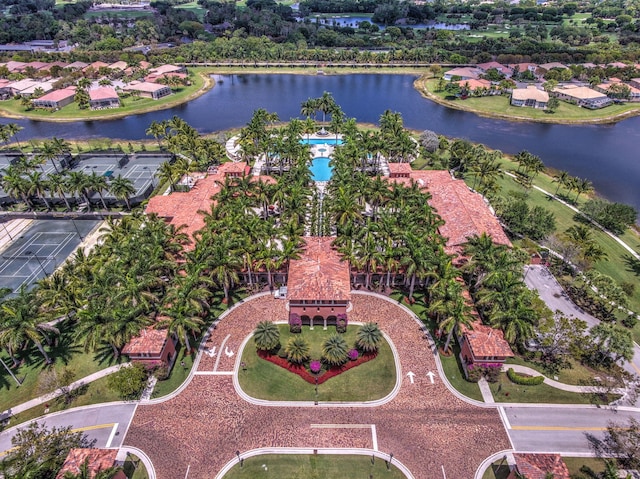 birds eye view of property with a water view