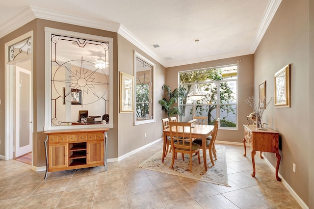 tiled dining area with crown molding