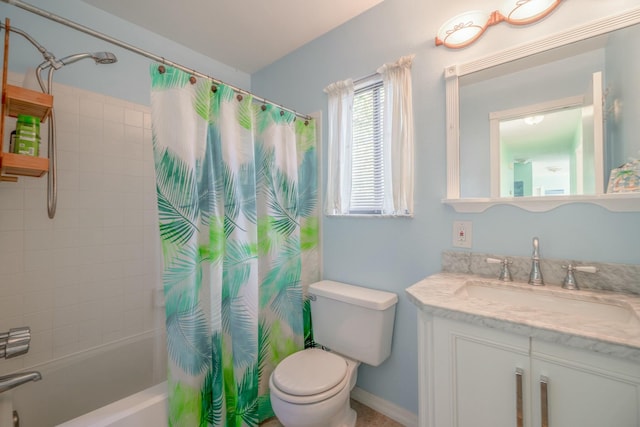 full bathroom with shower / tub combo, vanity, and toilet