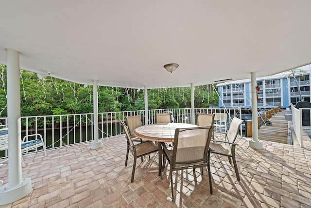 view of patio / terrace with a water view