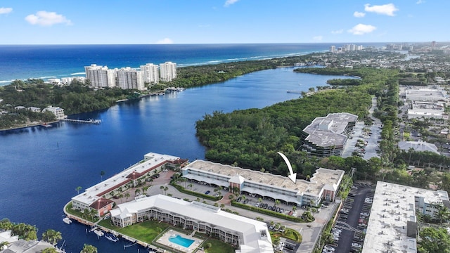 birds eye view of property featuring a water view