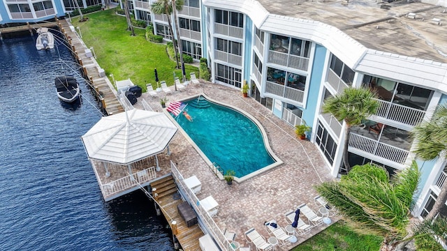 view of pool with a water view