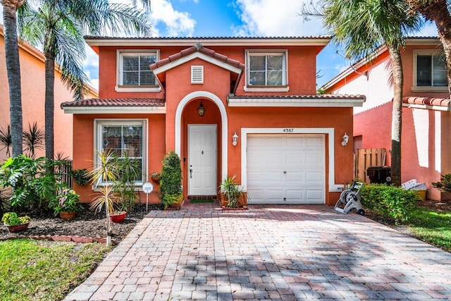 view of front of home featuring a garage