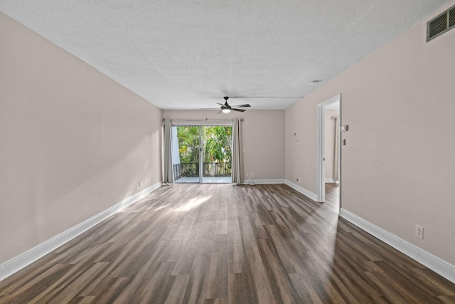 unfurnished room with a textured ceiling, ceiling fan, and dark hardwood / wood-style floors