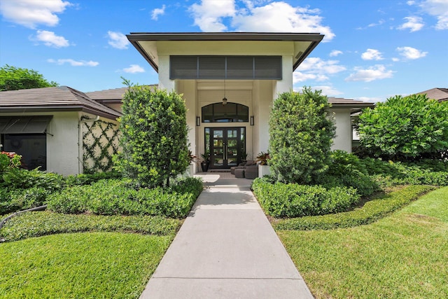 view of exterior entry with french doors