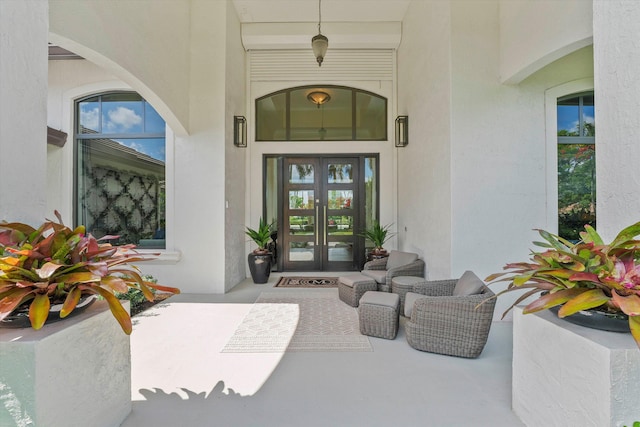 doorway to property featuring french doors