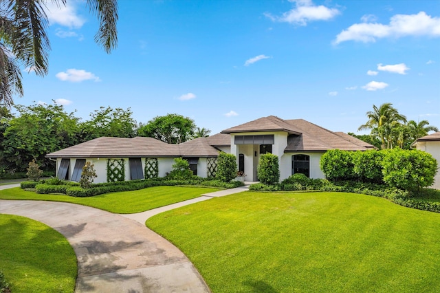 view of front of house with a front lawn