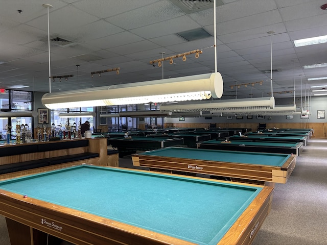 recreation room with bar, a drop ceiling, and billiards