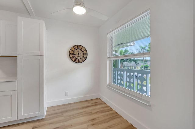 interior space featuring light wood-type flooring and ceiling fan