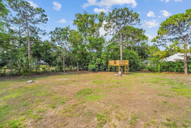 view of yard with a deck