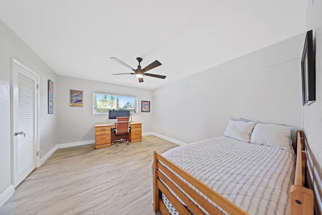 bedroom featuring ceiling fan and light wood-type flooring