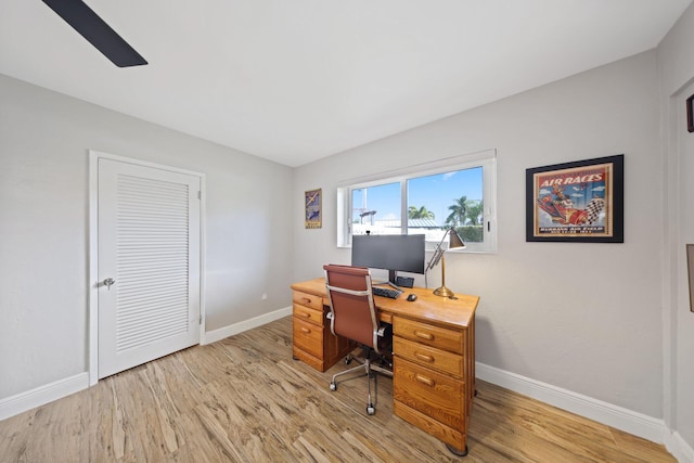 office with light hardwood / wood-style floors