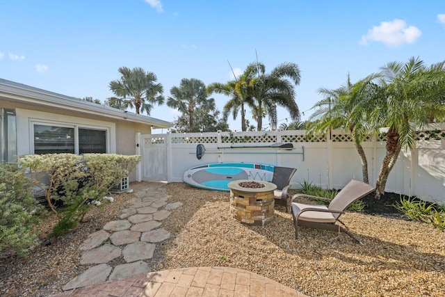 exterior space with an outdoor fire pit