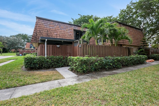 view of home's exterior featuring a lawn