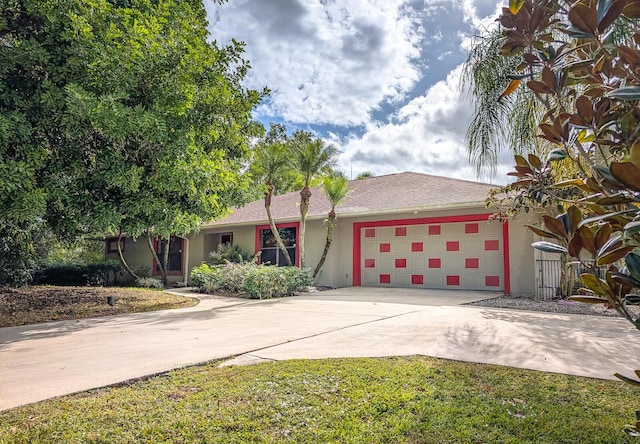 single story home with a garage