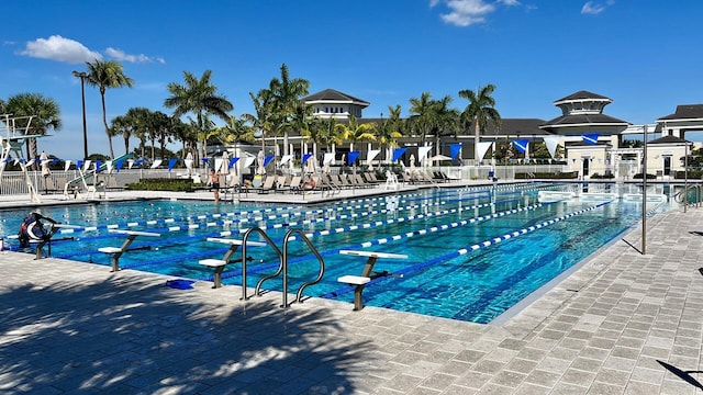 community pool featuring fence