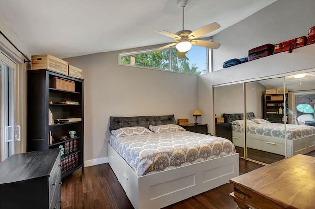 bedroom featuring vaulted ceiling, ceiling fan, a closet, and dark hardwood / wood-style floors