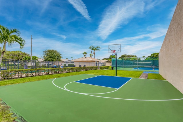 view of sport court featuring tennis court