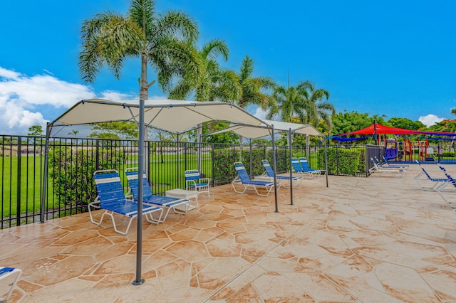 view of patio with a playground