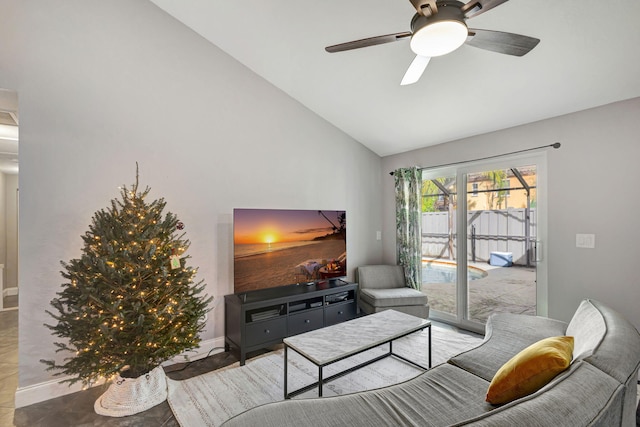 living room with ceiling fan and lofted ceiling