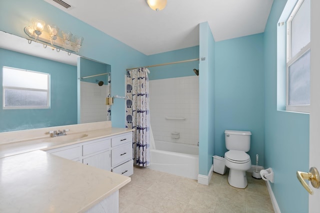 full bathroom with tile patterned flooring, vanity, toilet, and shower / tub combo with curtain