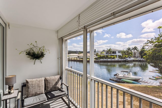 sunroom with a water view