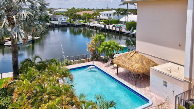 view of pool with a water view