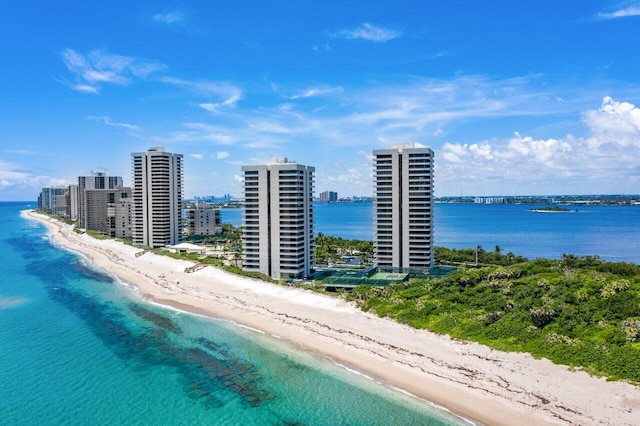 aerial view featuring a water view and a beach view