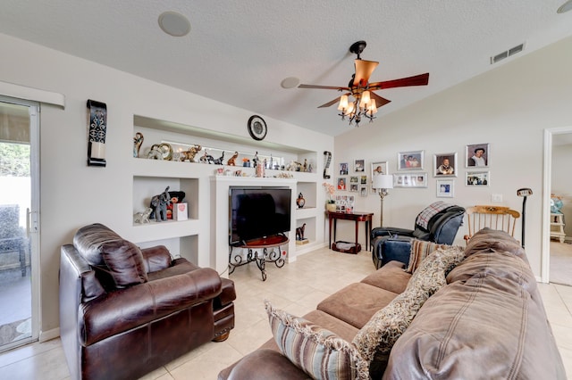 tiled living room with built in shelves, a textured ceiling, vaulted ceiling, and ceiling fan