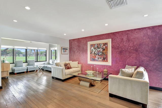 living room with light hardwood / wood-style floors