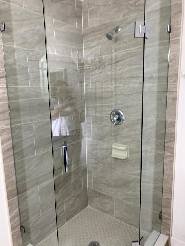 bathroom with a stall shower