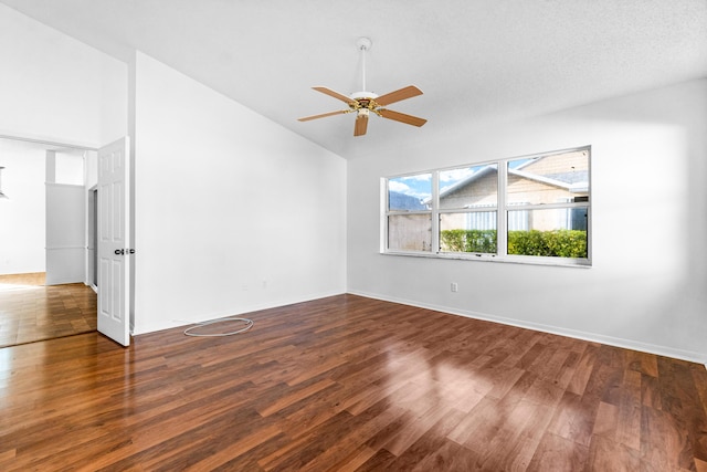 unfurnished room with a textured ceiling, ceiling fan, and dark wood-type flooring