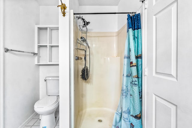 bathroom with toilet, tile patterned flooring, a textured ceiling, and walk in shower