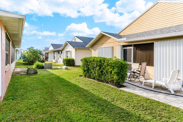 view of property's community with a water view and tennis court