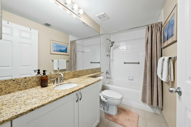 full bathroom with tile patterned floors, vanity, shower / bath combo, and toilet