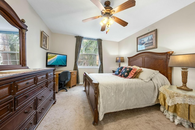 bedroom featuring ceiling fan and light colored carpet