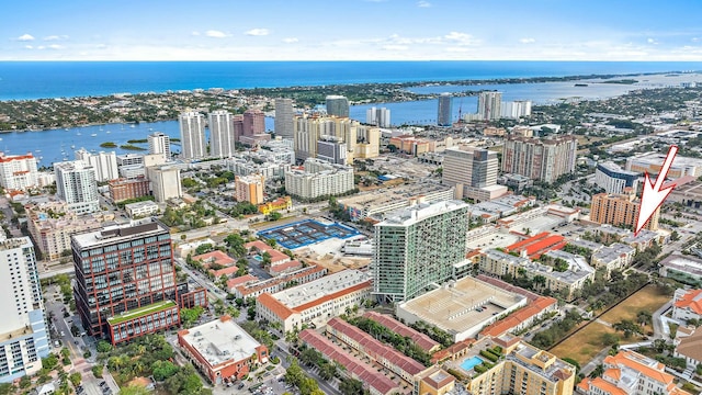 birds eye view of property featuring a water view