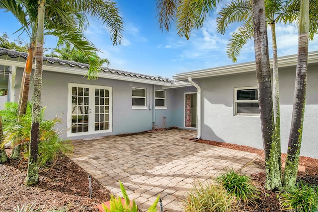 exterior space featuring a patio and french doors