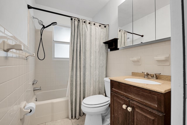 full bathroom with vanity, shower / bathtub combination with curtain, tile walls, tile patterned flooring, and toilet