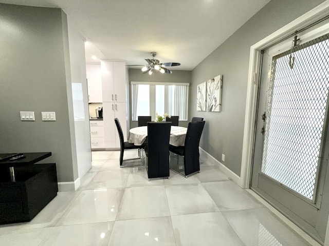 dining area featuring ceiling fan