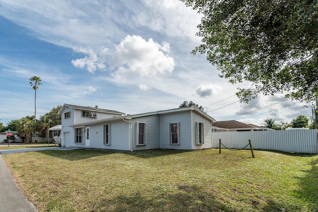 view of front of home with a front yard