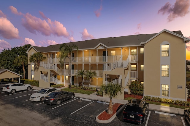 view of outdoor building at dusk