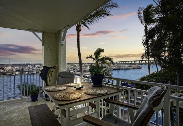 balcony at dusk with a water view