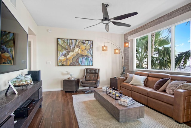 living room with a healthy amount of sunlight, ceiling fan, and wood-type flooring